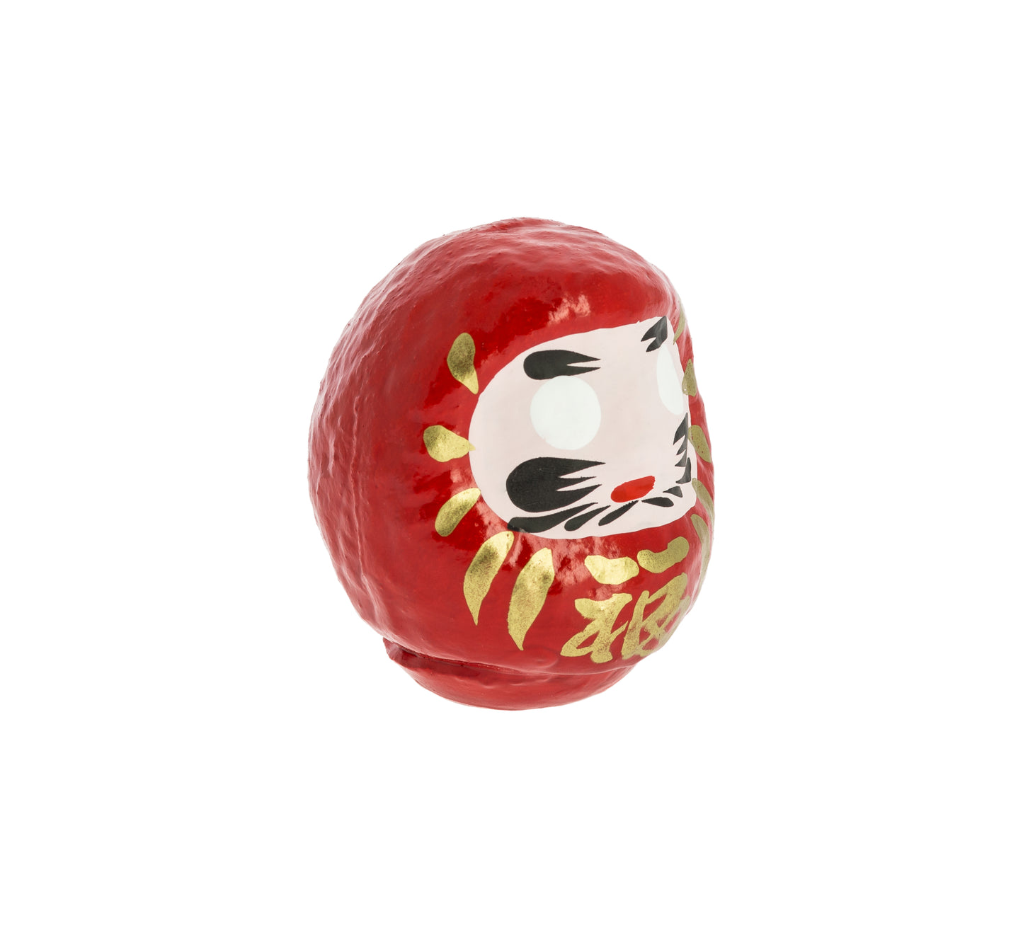 Poupée Daruma japonaise rouge traditionnelle avec détails dorés sur fond blanc